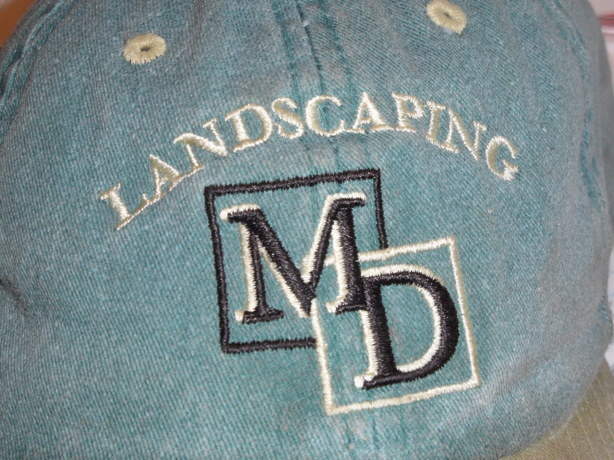 M D Landscaping & Design, Inc. Logo