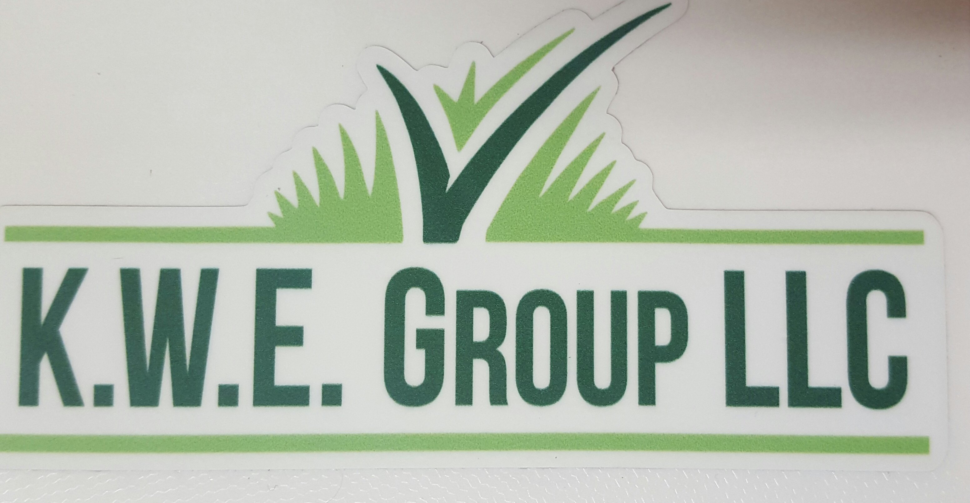 K.W.E. Group, LLC Logo