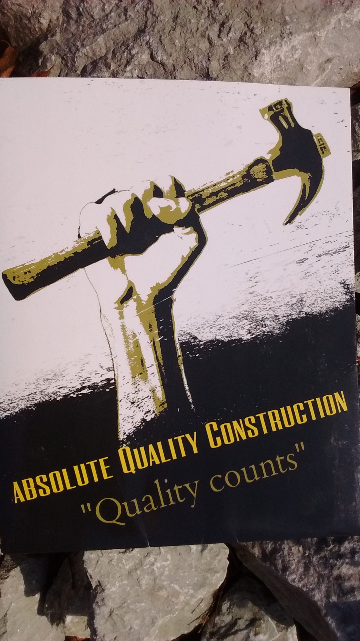 Absolute Quality Construction Logo