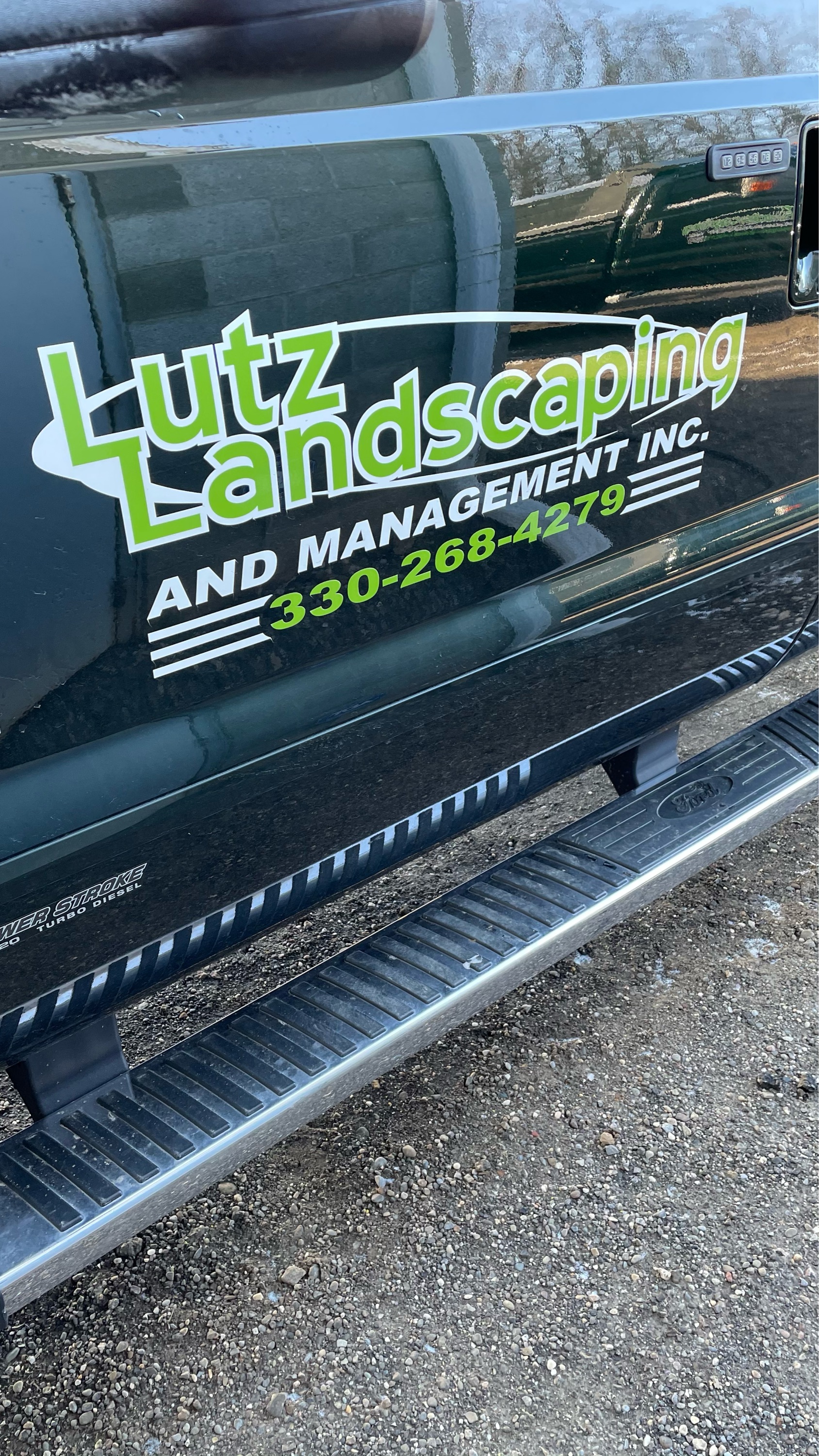 Lutz Landscaping & Management, Inc. Logo