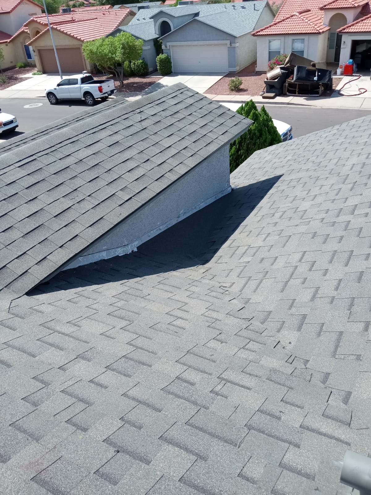 Let Me Cover Up Your Roof, LLC Logo