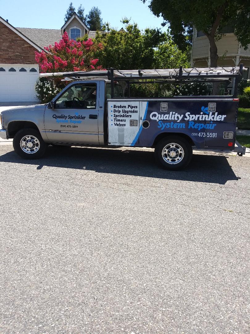 Quality Sprinkler System Repair Logo