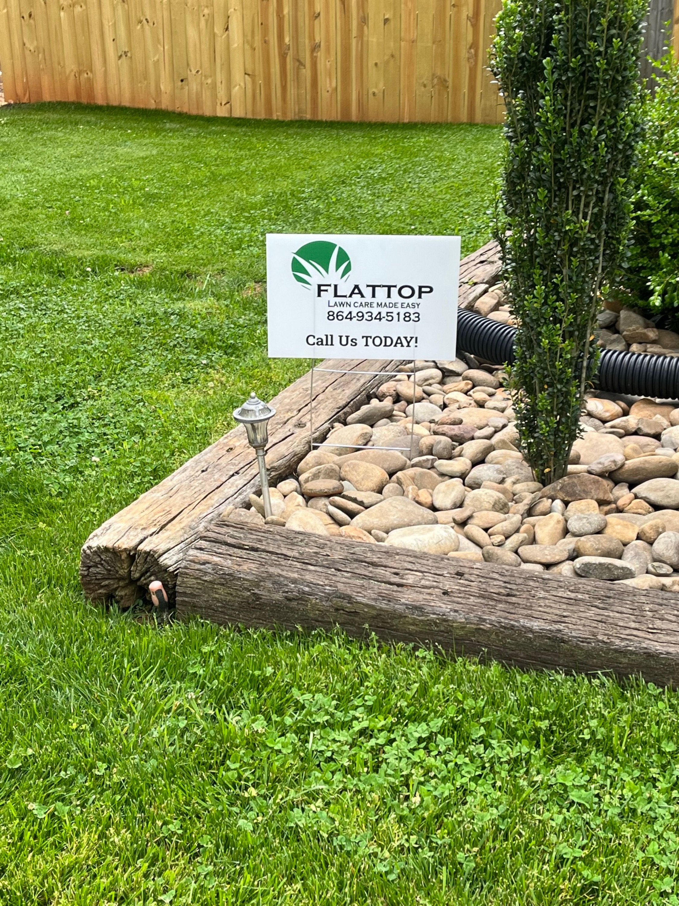 Flattop Lawn Care & Landscaping, LLC Logo