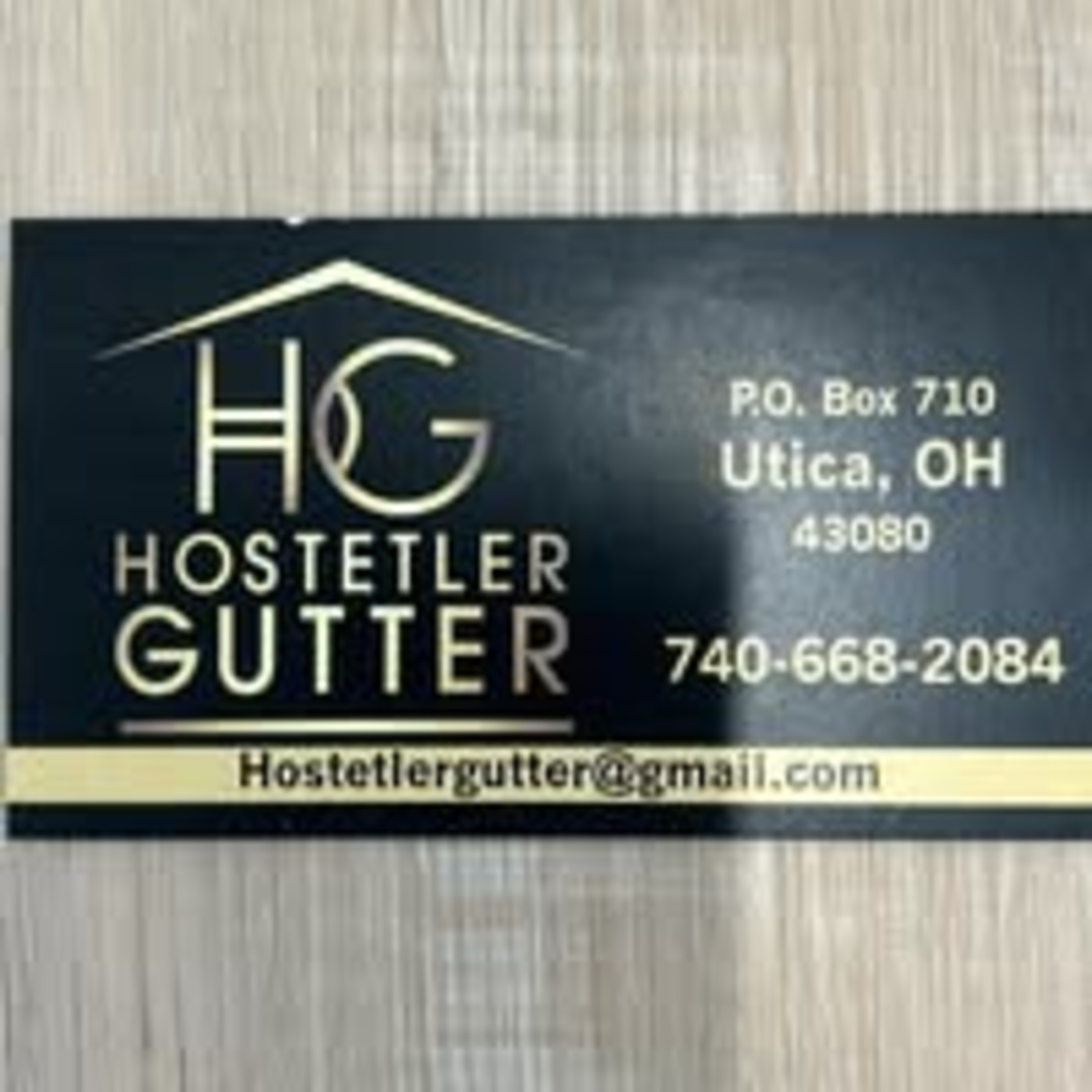 HOSTETLER SEAMLESS GUTTER Logo