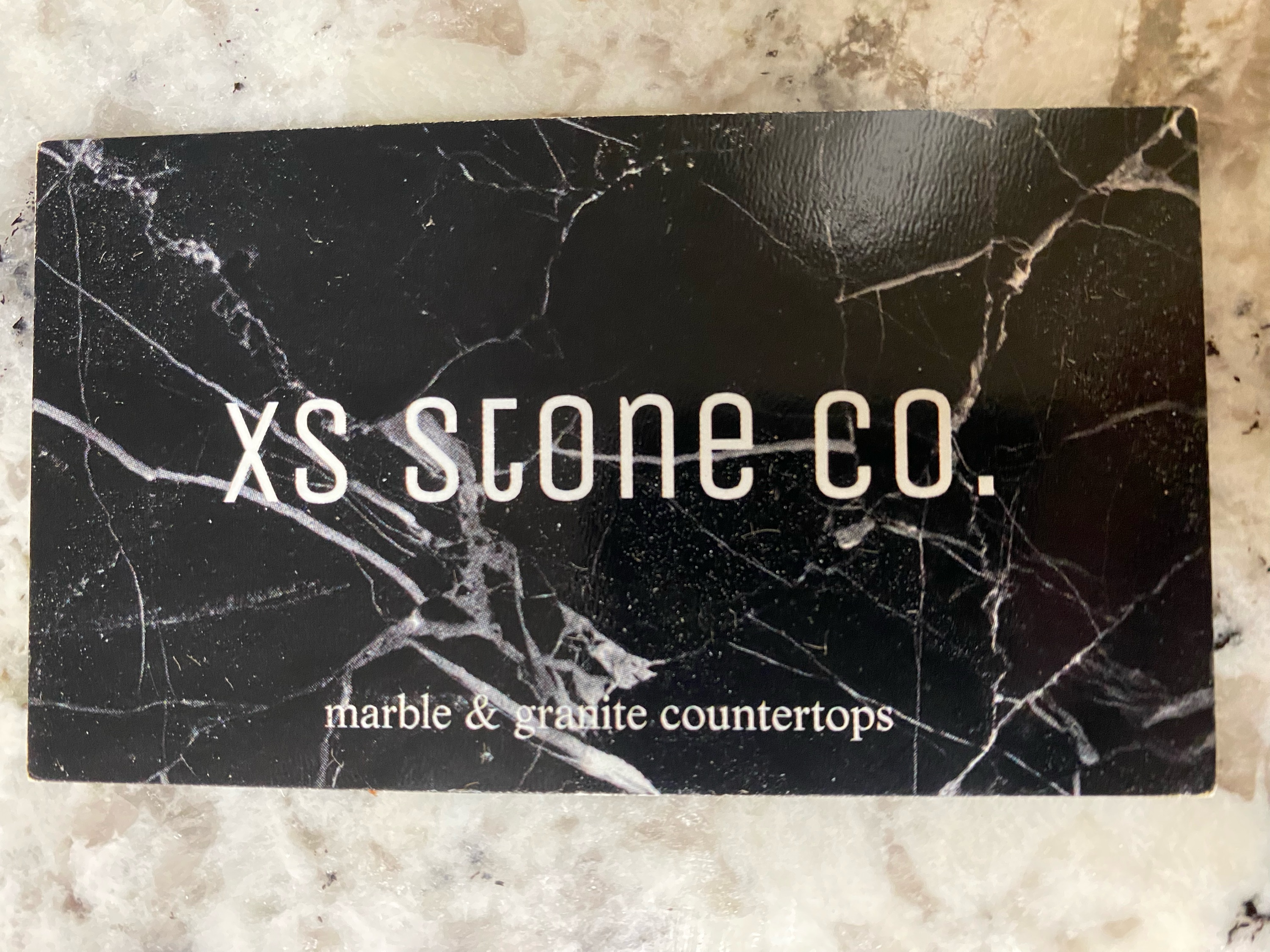 XS Stone Company Logo