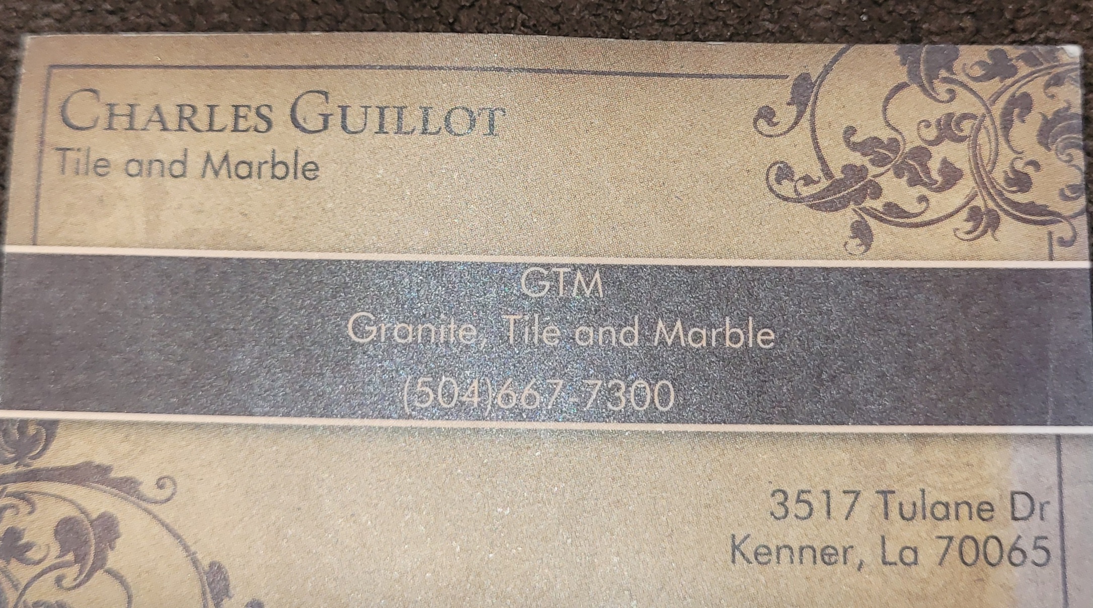 Guillot Tile and Marble, LLC Logo