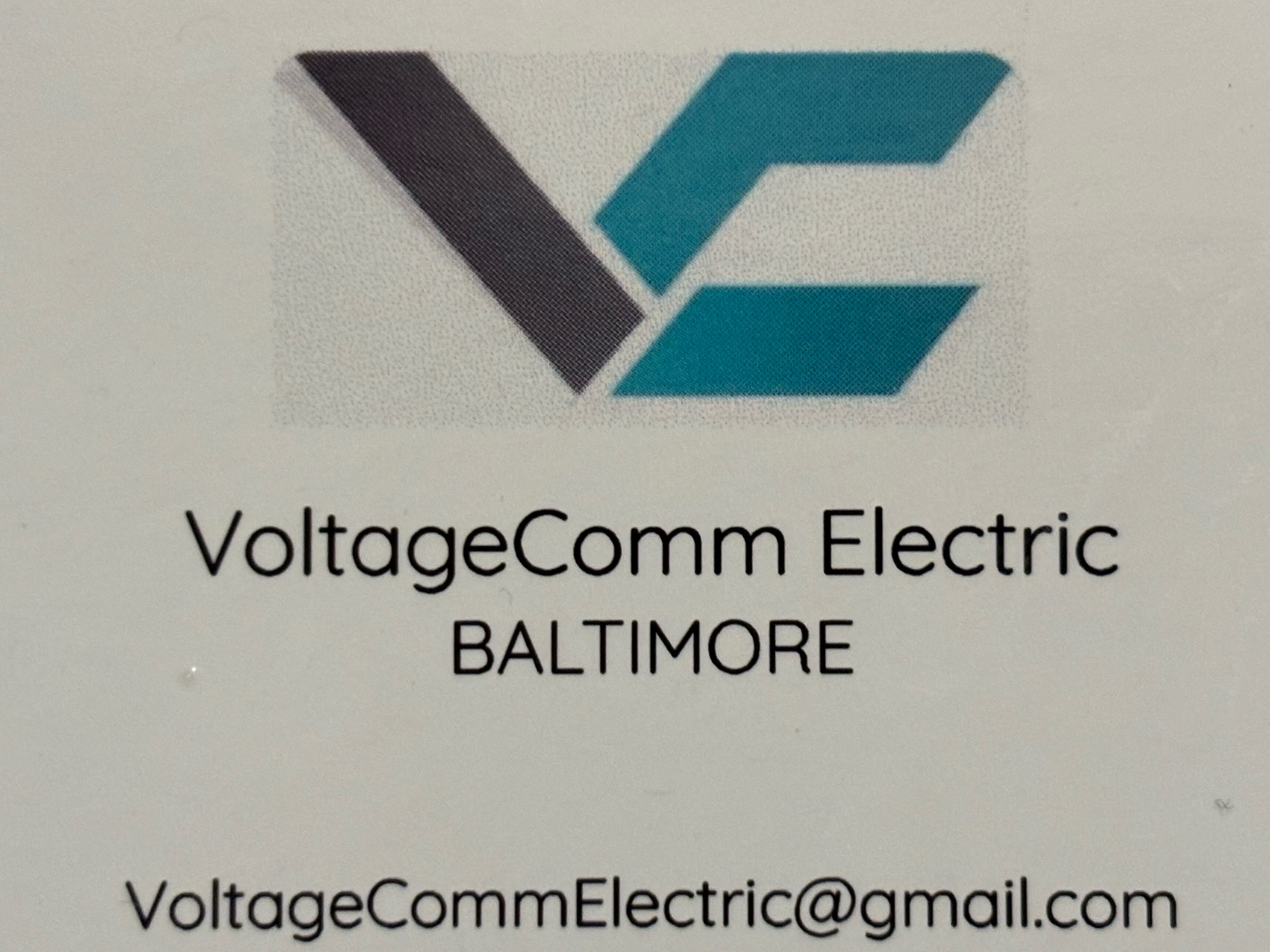 VoltageComm Electric Logo