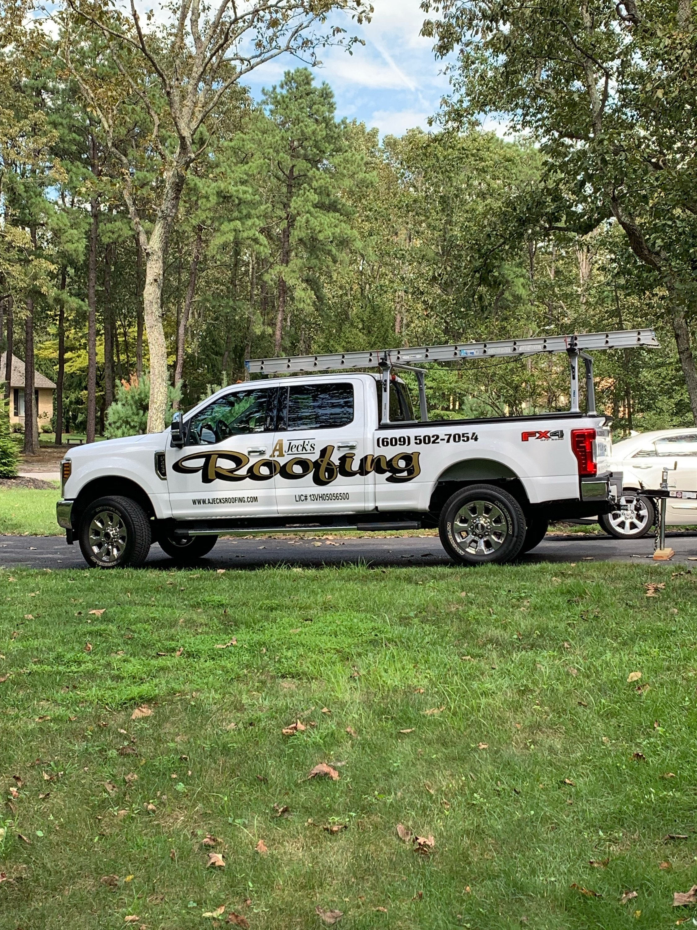 A' Jeck's Roofing Logo