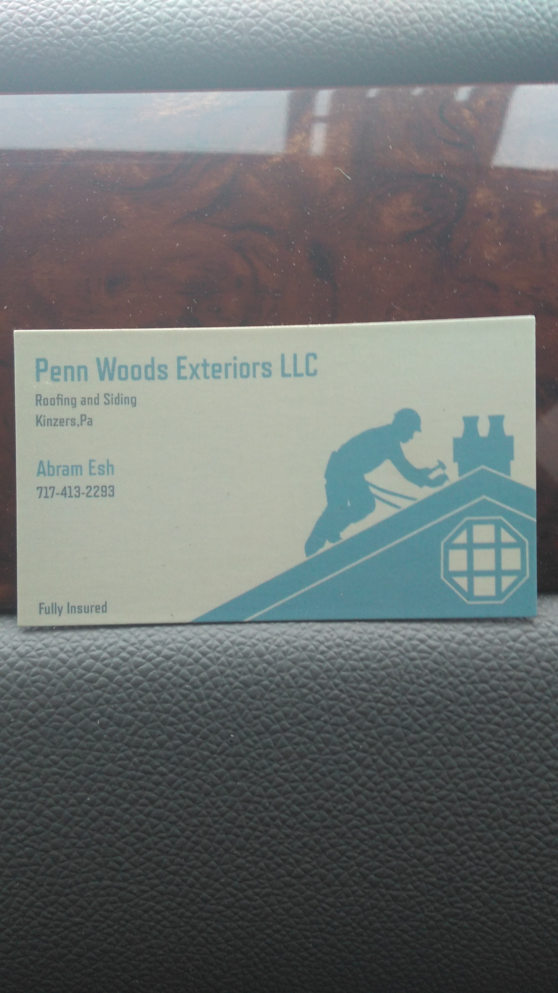 Penn Woods Exteriors, LLC Logo