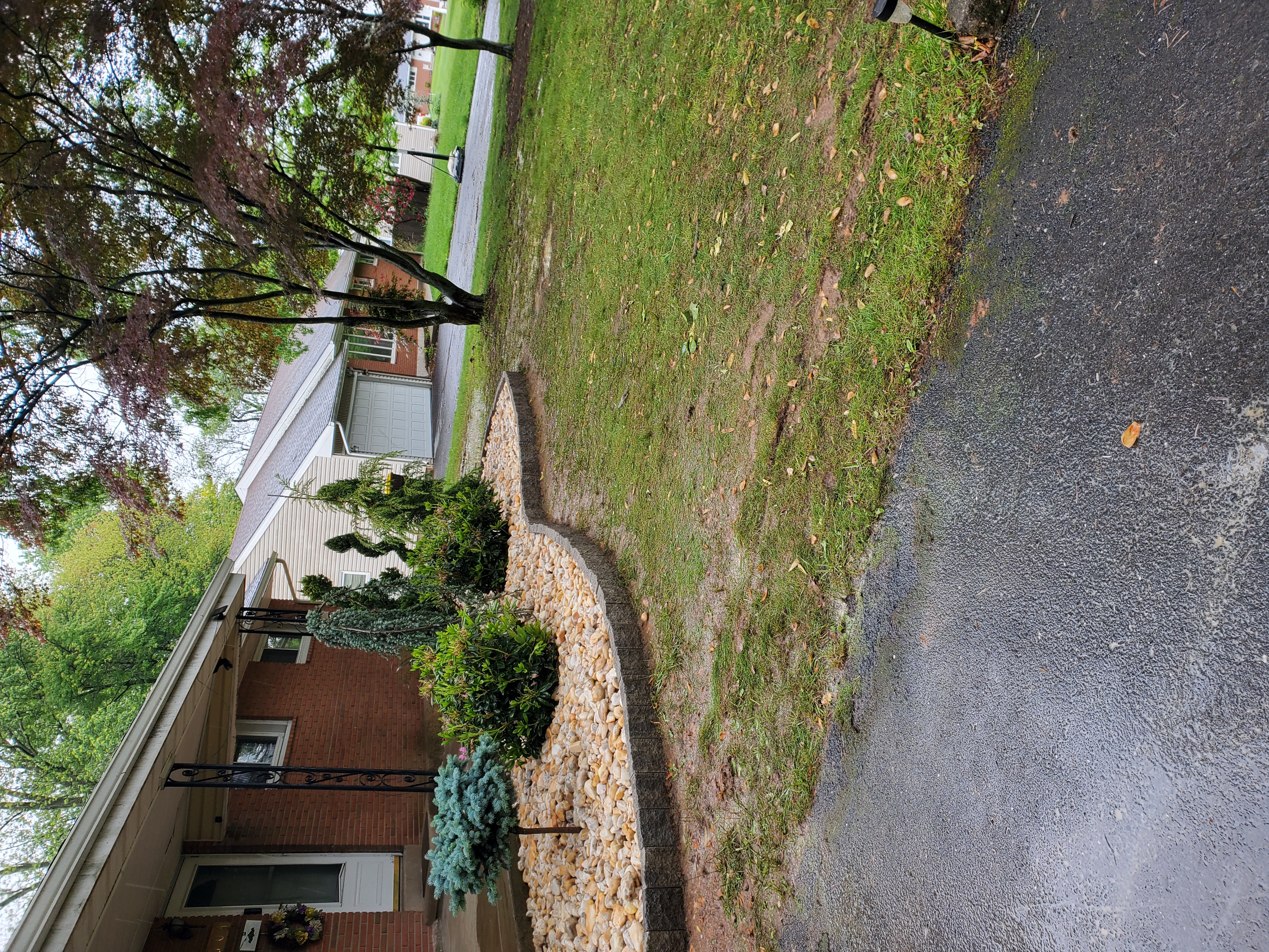 Guaman Landscaping Logo