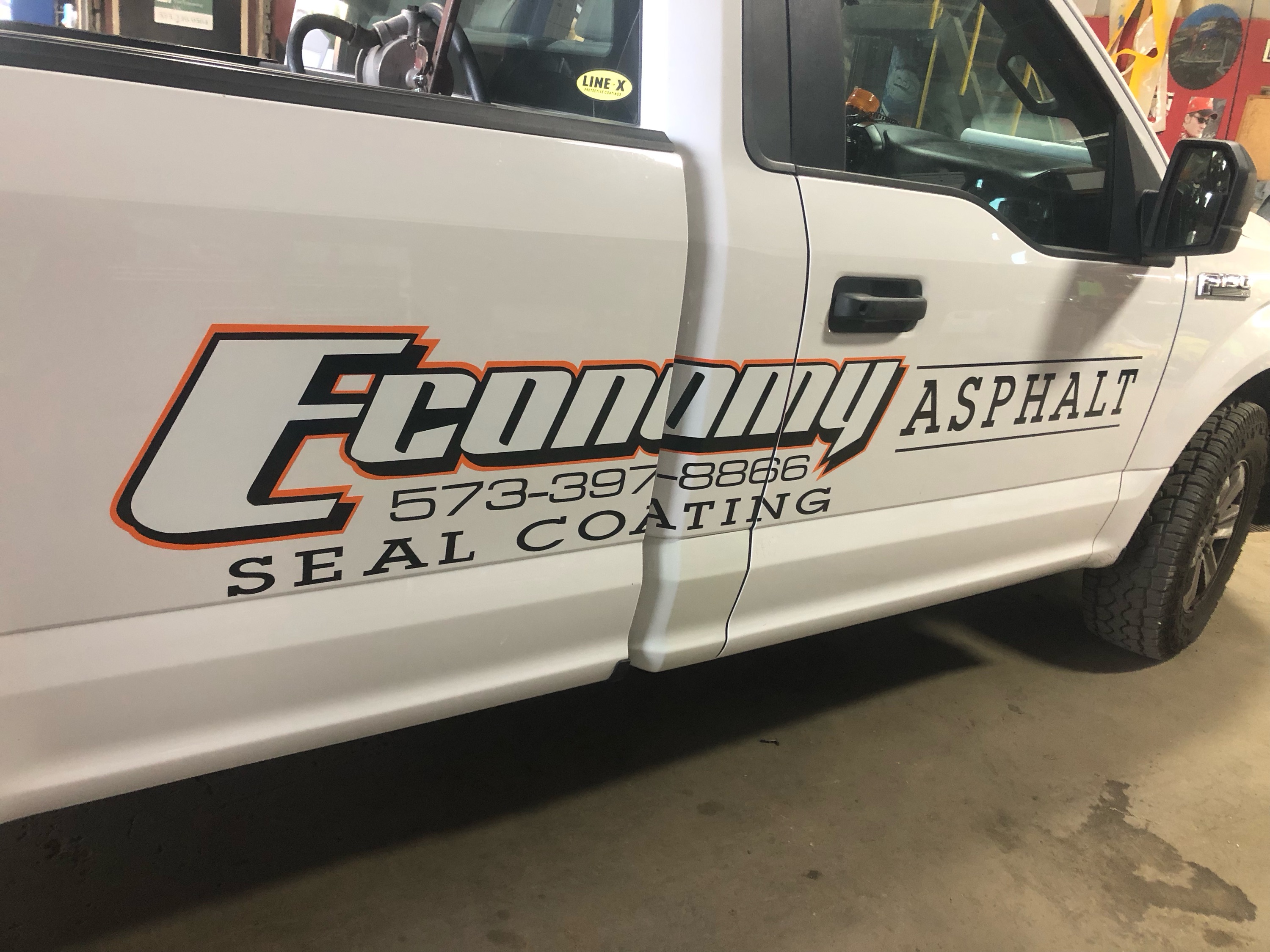 Economy Asphalt & Seal Coating, LLC Logo