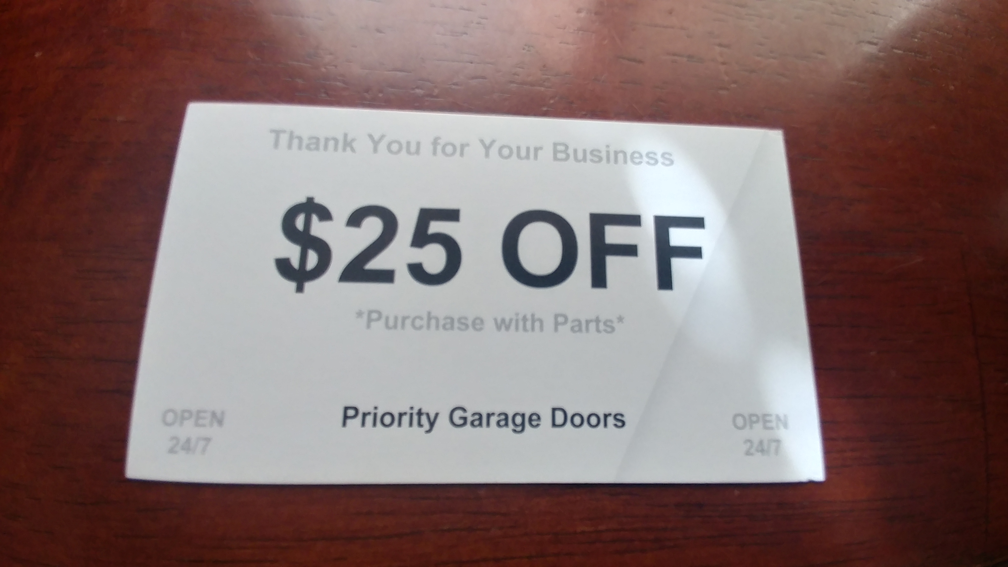 Priority Garage Door Logo