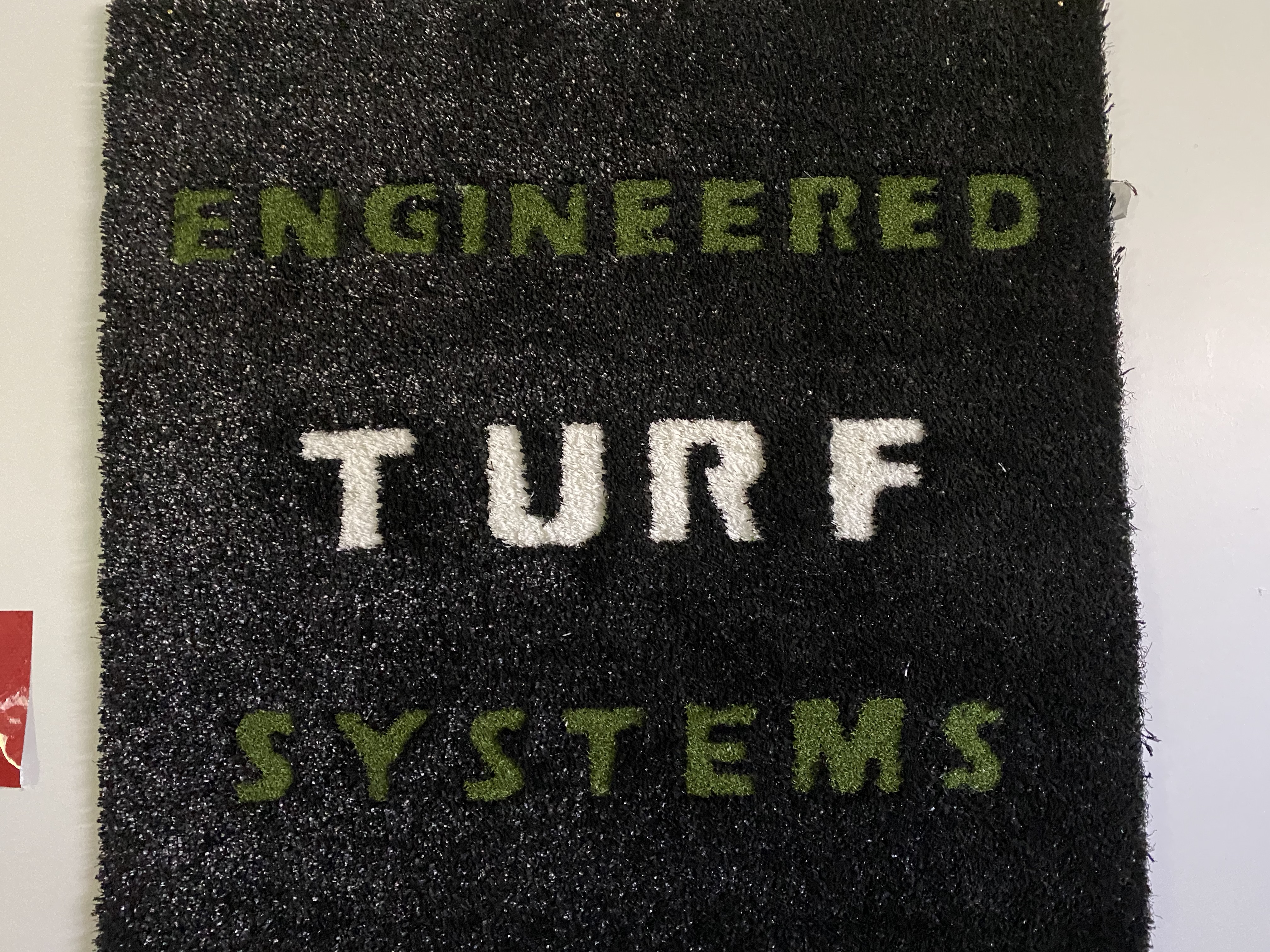 Engineered Turf Systems, Inc. Logo