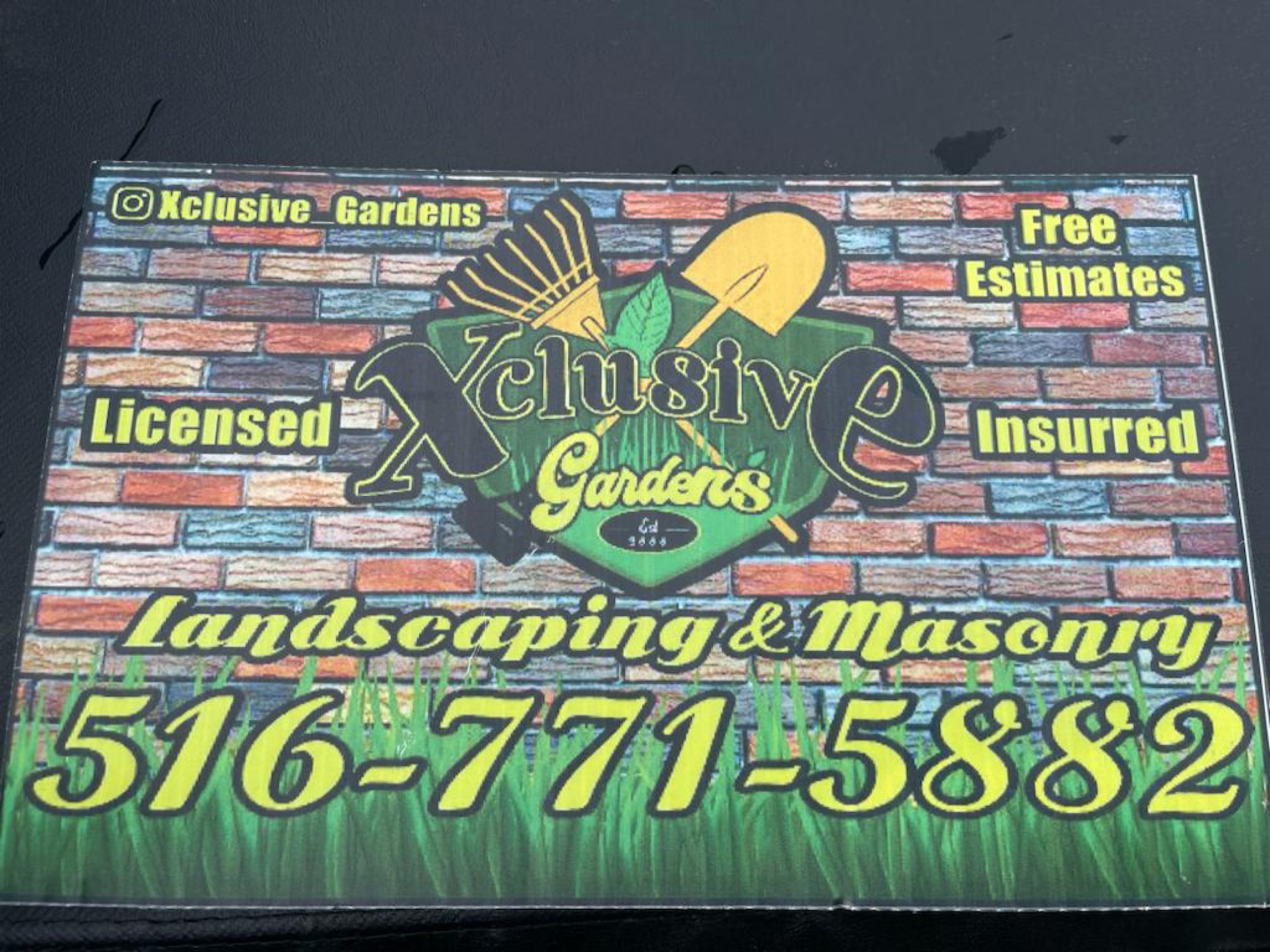 Xclusive Gardens Landscaping and Masonary Logo