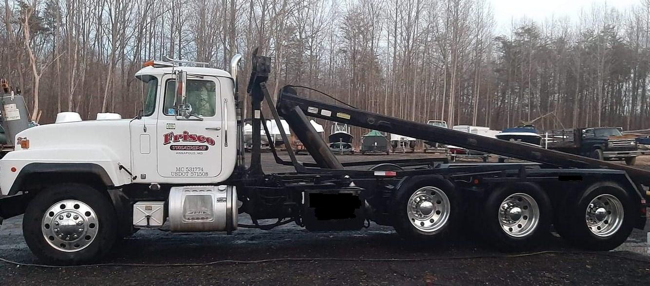 Frisco Trucking and Dumpsters Logo