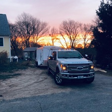 Pearce Landscaping & Hauling logo