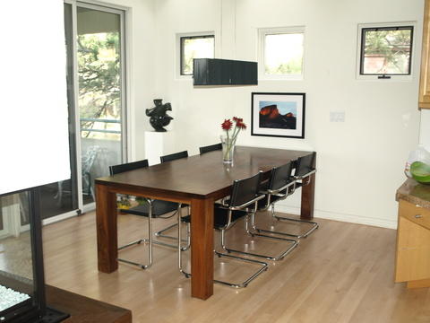 Modern Dining Room with black and chrome dinning chairs