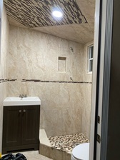 Rojas Tile and Marble Services, Inc. logo