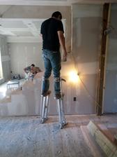 Agustin's Universal Drywall logo