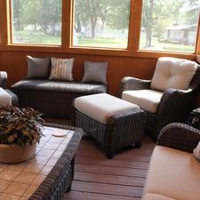 Contemporary Sunroom with tiled wicker coffee table