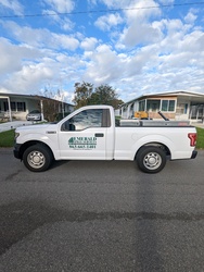 Emerald Spray Service logo