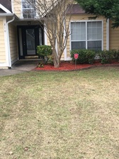 Tip Top Lawn Service logo