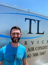 TL Services logo