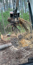 McNeils Clearing & Construction Services logo