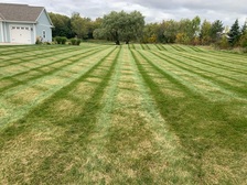 Hometown Lawn Care logo
