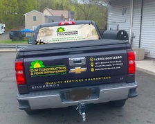 Logo for D.M Construction and Home Improvement, LLC