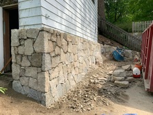 ROMAN LANDSCAPING AND MASONRY LLC logo