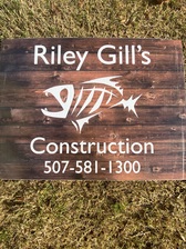 Riley Gill's Construction and Remodeling logo