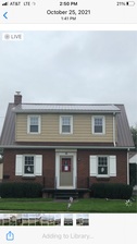 Logo for L & M Roofing