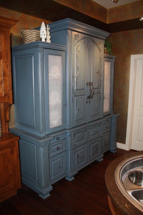 Traditional Kitchen with large blue custom cabinet