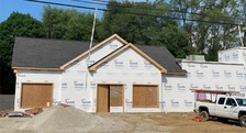 J&M Roofing Exteriors logo