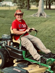 Red White & Blue Lawn Care logo
