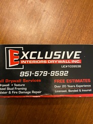 Exclusive Interiors Drywall logo