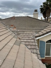 Logo for Manna Roofing Company