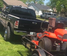 Logo for Durham Lawn Care and Landscaping