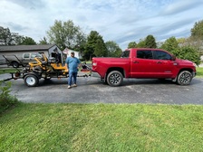 Moore Mowing Co logo