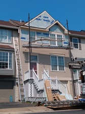 Logo for Romero Roofing & Gutters
