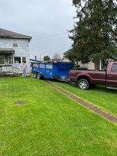 Logo for Motola Landscaping and Junk Hauling
