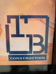 T B Construction logo