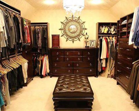 Traditional Closet with black tufted sitting bench
