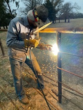 Customarc Welding and Fencing logo