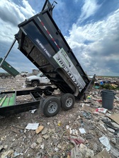 Logo for Volusia Junk and Debris Removal LLC