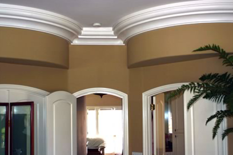 Traditional Hallway with white crown moulding