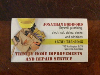 Trinity Home Improvements logo