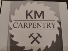 KM Carpentry logo