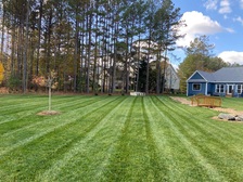Logo for Lara's Lawn Care Service